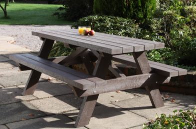A 1.8m long A Frame picnic table made from recycled plastic located on a patio