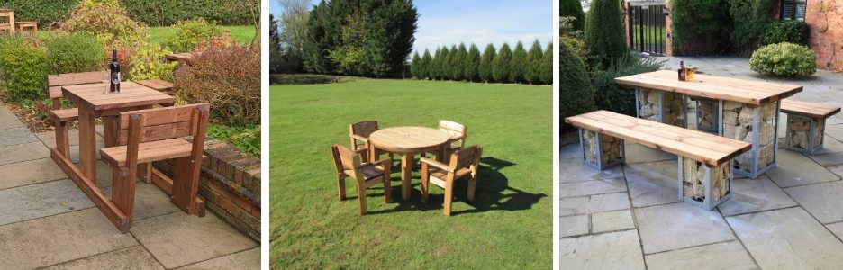 A two seater wooden picnic table, a round wooded outdoor table and four chairs around, a rectangular table and two benches either side