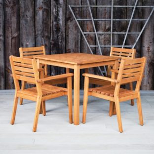 A Robinia Hardwood Outdoor Square Dining Table and 4 chairs set on a deck