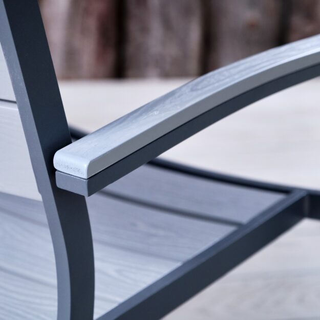 close up arm of outdoor plastic dining chair