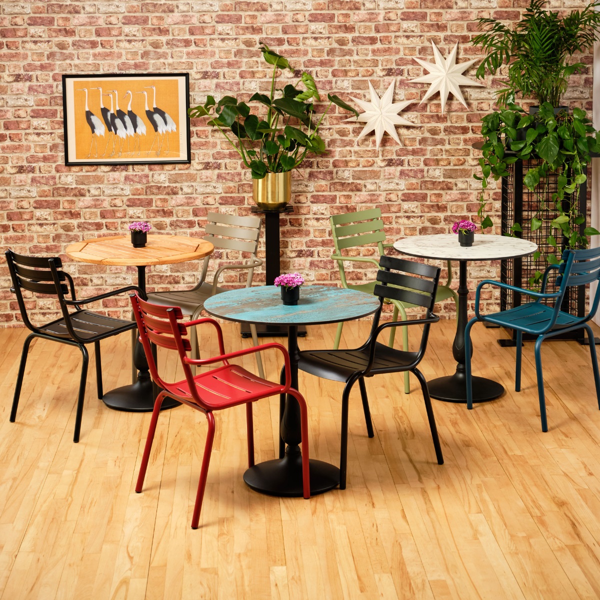 Colourful bistro pedestal tables and chairs