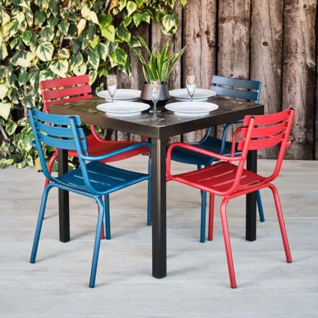 Red and Blue Metal Outdoor Chairs and square Black Table