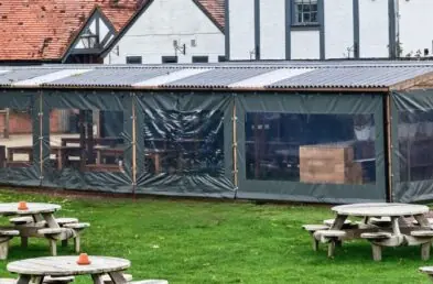 wooden Pub shelter for outdoor sports viewing